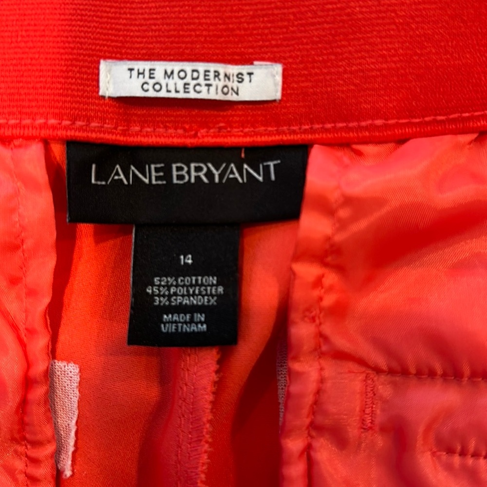 Ankle work pant. Never worn.  Slit at bottom  snap and zipper close